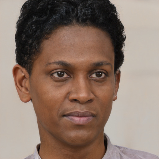 Neutral black young-adult female with short  black hair and brown eyes