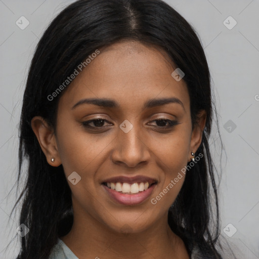 Joyful latino young-adult female with long  black hair and brown eyes