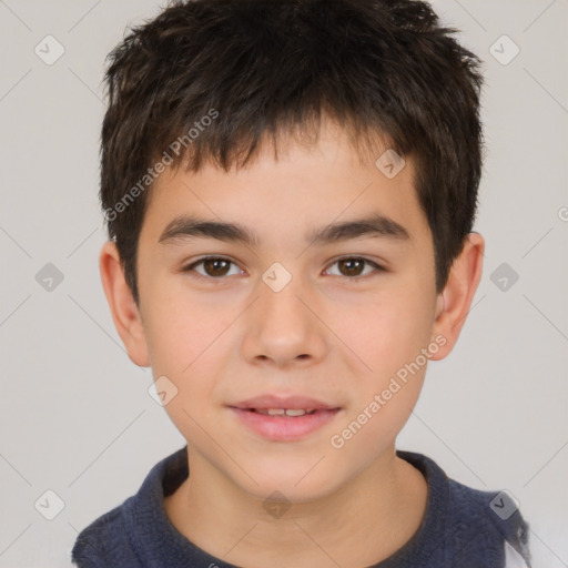 Joyful white child male with short  brown hair and brown eyes