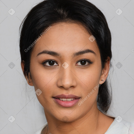 Joyful asian young-adult female with medium  brown hair and brown eyes