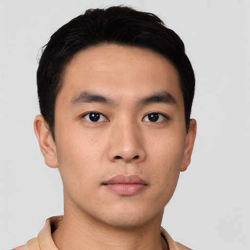 Neutral asian young-adult male with short  black hair and brown eyes