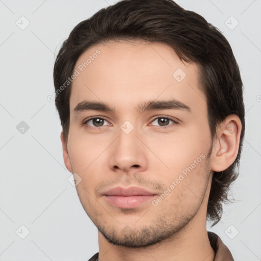 Neutral white young-adult male with short  brown hair and brown eyes