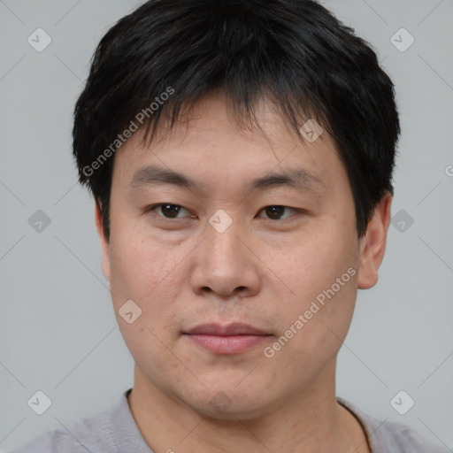 Neutral asian young-adult male with short  black hair and brown eyes