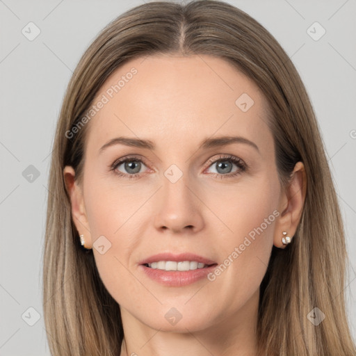 Joyful white young-adult female with long  brown hair and grey eyes