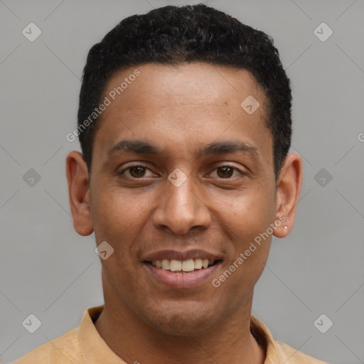 Joyful latino young-adult male with short  black hair and brown eyes