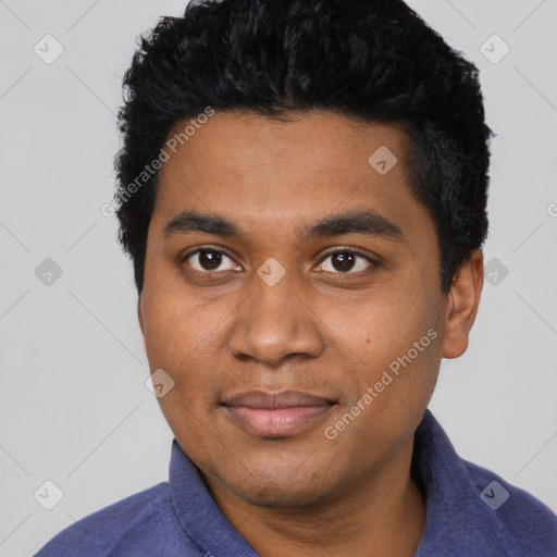 Joyful black young-adult male with short  black hair and brown eyes
