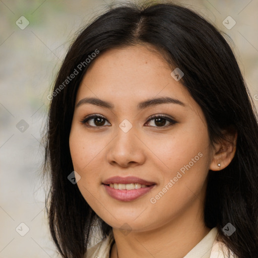 Joyful asian young-adult female with long  brown hair and brown eyes