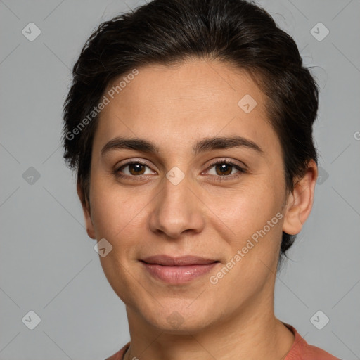 Joyful white adult female with short  brown hair and brown eyes