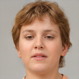 Neutral white young-adult female with short  brown hair and brown eyes