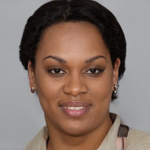 Joyful latino young-adult female with short  brown hair and brown eyes