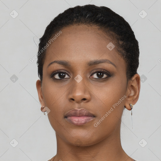 Neutral black young-adult female with short  brown hair and brown eyes