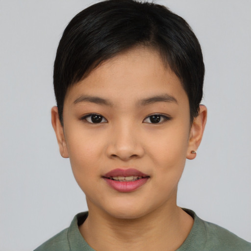 Joyful asian young-adult female with short  brown hair and brown eyes