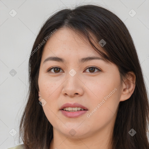 Joyful white young-adult female with long  brown hair and brown eyes