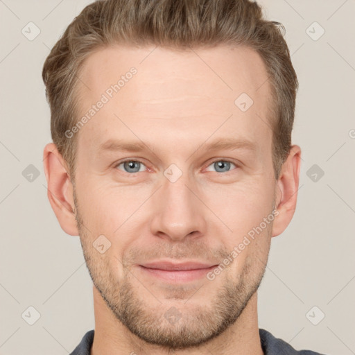 Joyful white adult male with short  brown hair and grey eyes