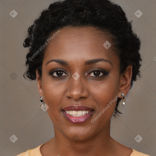 Joyful black young-adult female with medium  brown hair and brown eyes