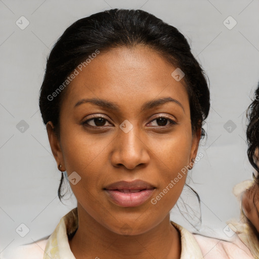 Joyful latino young-adult female with medium  brown hair and brown eyes