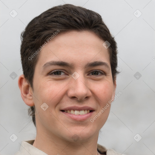 Joyful white young-adult female with short  brown hair and grey eyes