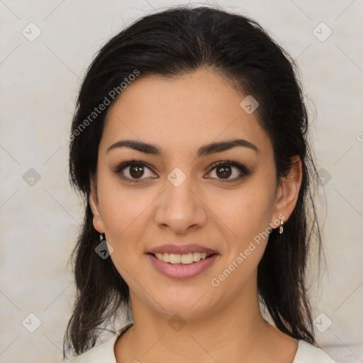 Joyful latino young-adult female with medium  brown hair and brown eyes