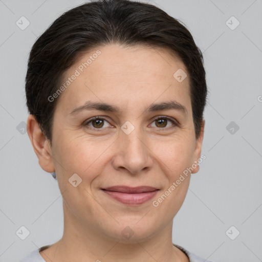 Joyful white adult female with short  brown hair and brown eyes