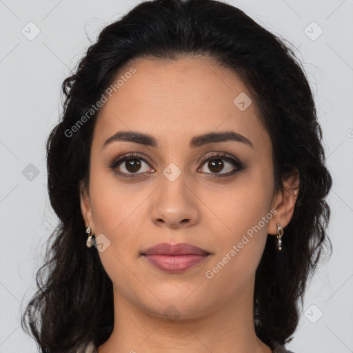 Joyful latino young-adult female with long  brown hair and brown eyes