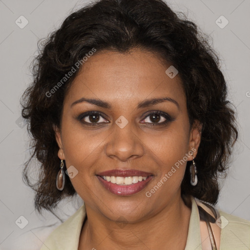 Joyful black adult female with medium  brown hair and brown eyes