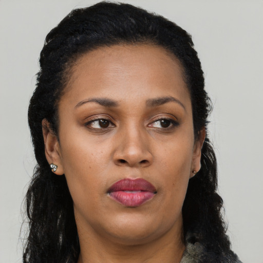 Neutral black adult female with long  black hair and brown eyes