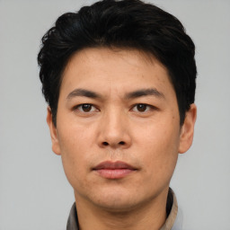 Neutral asian young-adult male with short  black hair and brown eyes