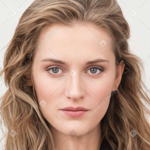 Neutral white young-adult female with long  brown hair and green eyes