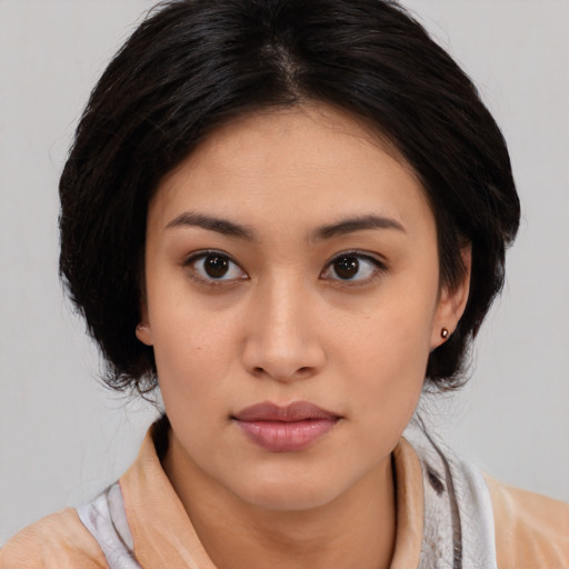 Neutral latino young-adult female with medium  brown hair and brown eyes