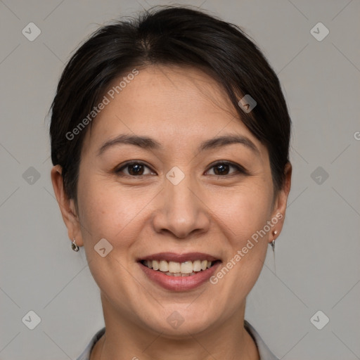 Joyful white adult female with short  brown hair and brown eyes