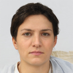 Neutral white young-adult female with short  brown hair and brown eyes