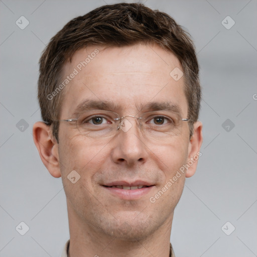 Joyful white adult male with short  brown hair and grey eyes