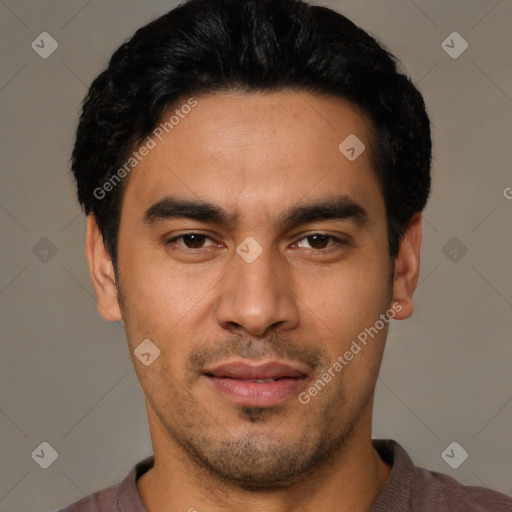 Joyful asian young-adult male with short  black hair and brown eyes