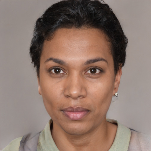 Neutral latino young-adult female with short  black hair and brown eyes