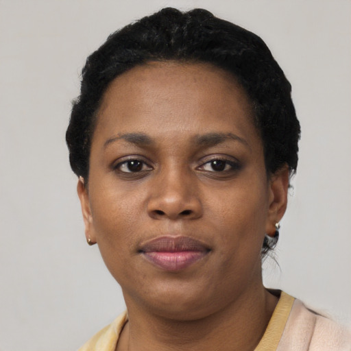 Neutral black young-adult female with short  black hair and brown eyes