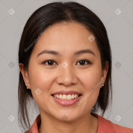 Joyful white young-adult female with medium  brown hair and brown eyes