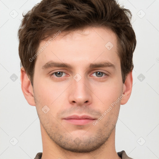 Neutral white young-adult male with short  brown hair and grey eyes