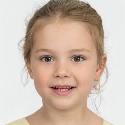 Joyful white child female with medium  brown hair and brown eyes