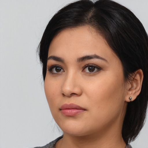 Neutral asian young-adult female with medium  black hair and brown eyes