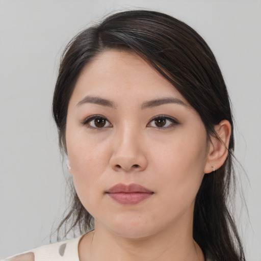 Neutral asian young-adult female with medium  brown hair and brown eyes