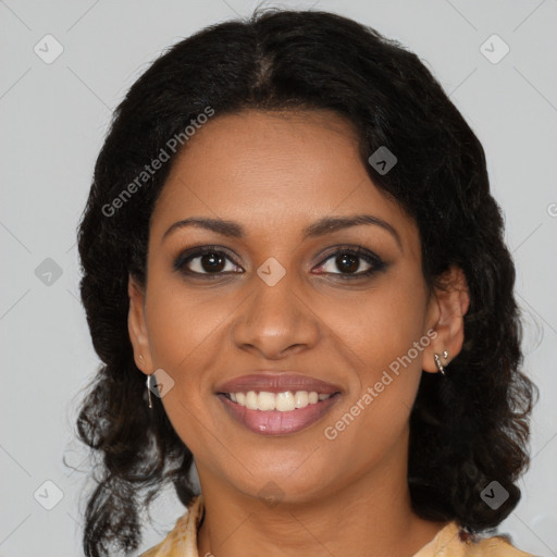 Joyful black young-adult female with medium  brown hair and brown eyes