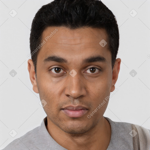 Neutral latino young-adult male with short  black hair and brown eyes