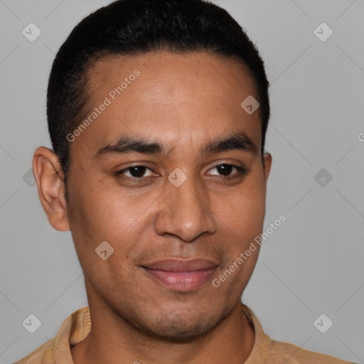 Joyful latino young-adult male with short  brown hair and brown eyes