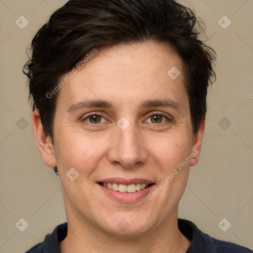 Joyful white adult female with short  brown hair and brown eyes