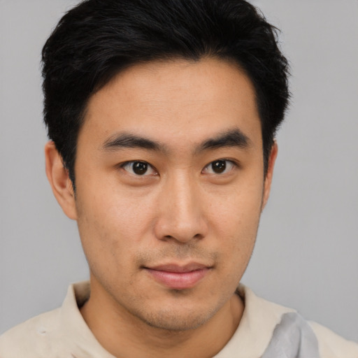 Neutral asian young-adult male with short  black hair and brown eyes