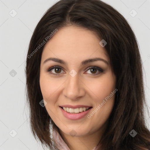 Joyful white young-adult female with long  brown hair and brown eyes