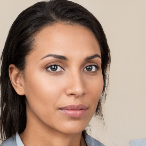 Neutral latino young-adult female with medium  brown hair and brown eyes