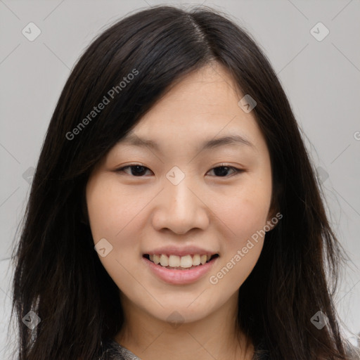 Joyful asian young-adult female with long  brown hair and brown eyes