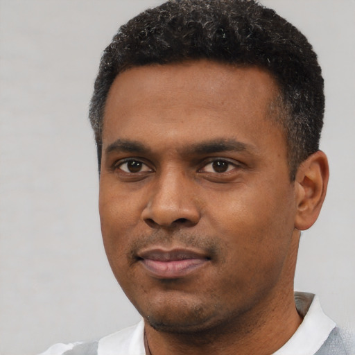 Neutral black young-adult male with short  black hair and brown eyes