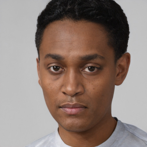 Neutral black young-adult male with short  black hair and brown eyes